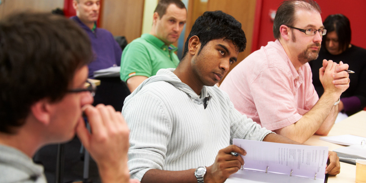 A group of students being taught in a seminar